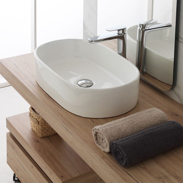 Lavabo da appoggio ovale 55cm in ceramica bianca lucida Feridras